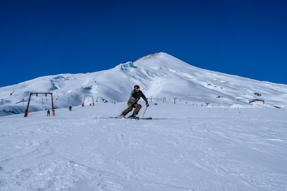 Volcan Villarrica Ski Center in Chile - a person skiing down the side of a mountain.