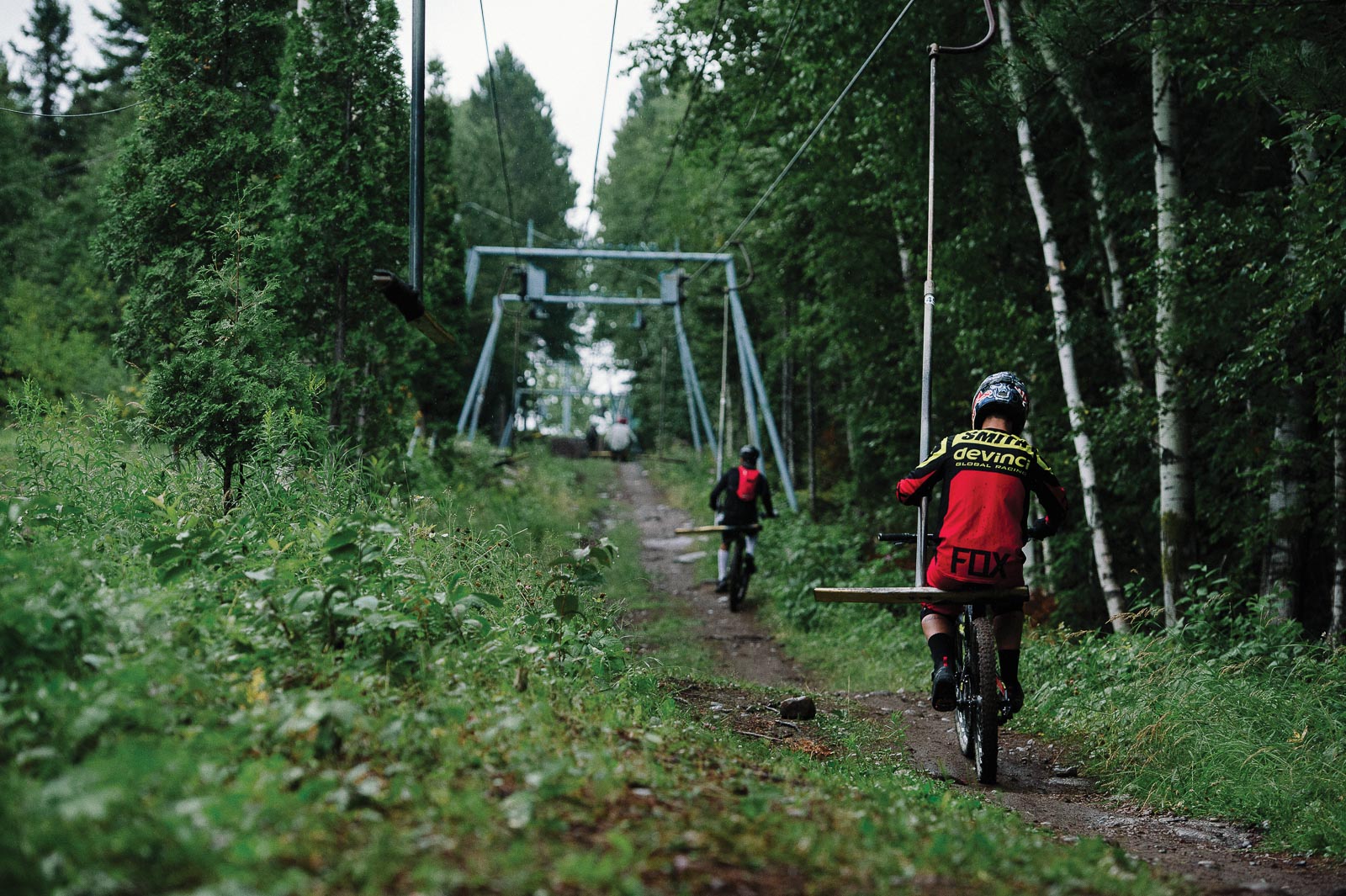 Mont-Bélu in Canada - a couple of people riding bikes on a trail.