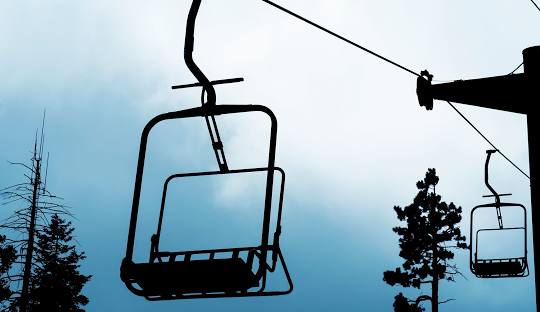 View of the ski lift at Mt Lemmon Ski Valley, Arizona, showcasing a picturesque winter scene.