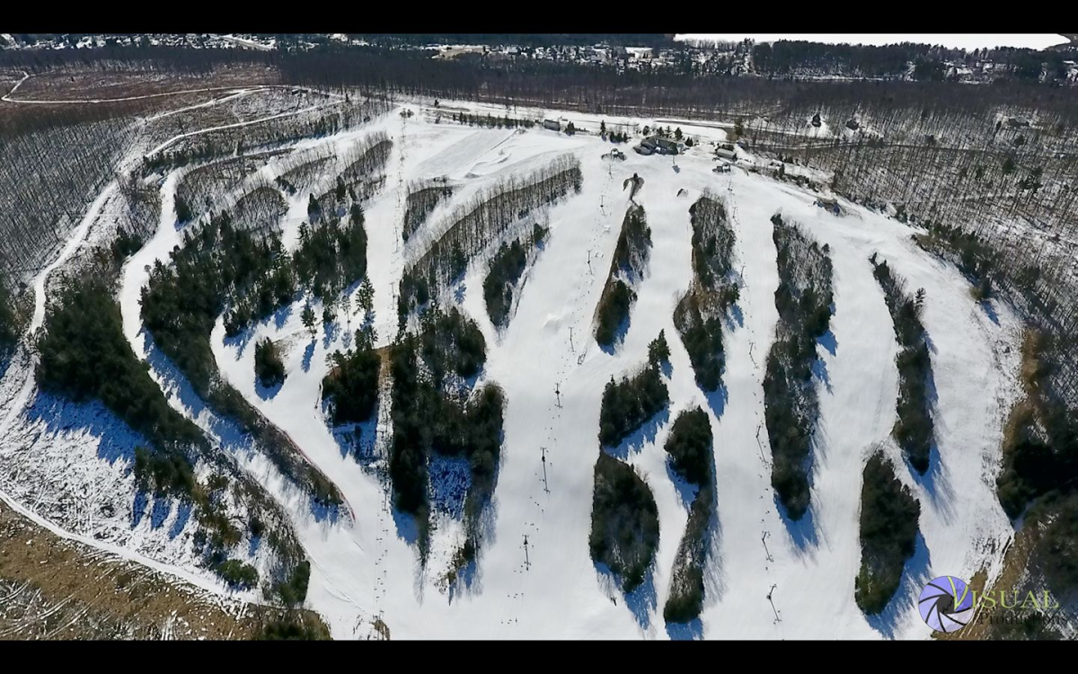 Norway Mountain in USA - an aerial view of a snow covered mountain.