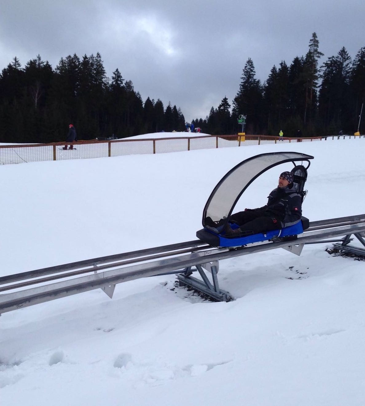 Hempelsberg | Geiersberg – Oberwarmensteinach in Germany - a person sitting on a sler in the snow.