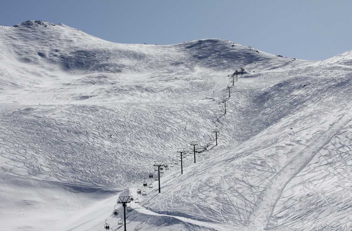 Mt Dobson in New Zealand - a ski lift going up the side of a mountain.
