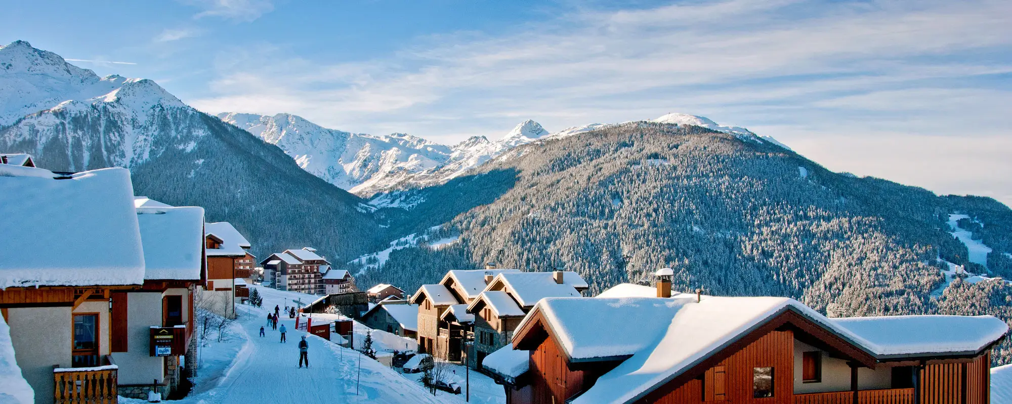 Les Arcs | Peisey-Vallandry in France - a snowy village with mountains in the background.