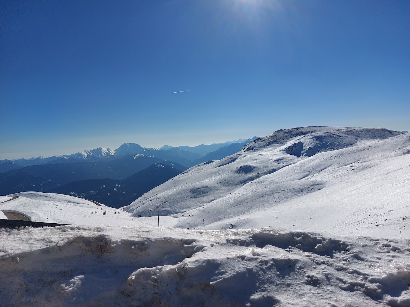 Velouchi Snow Centre S.A. in Greece - a view from the top of a snowy mountain.