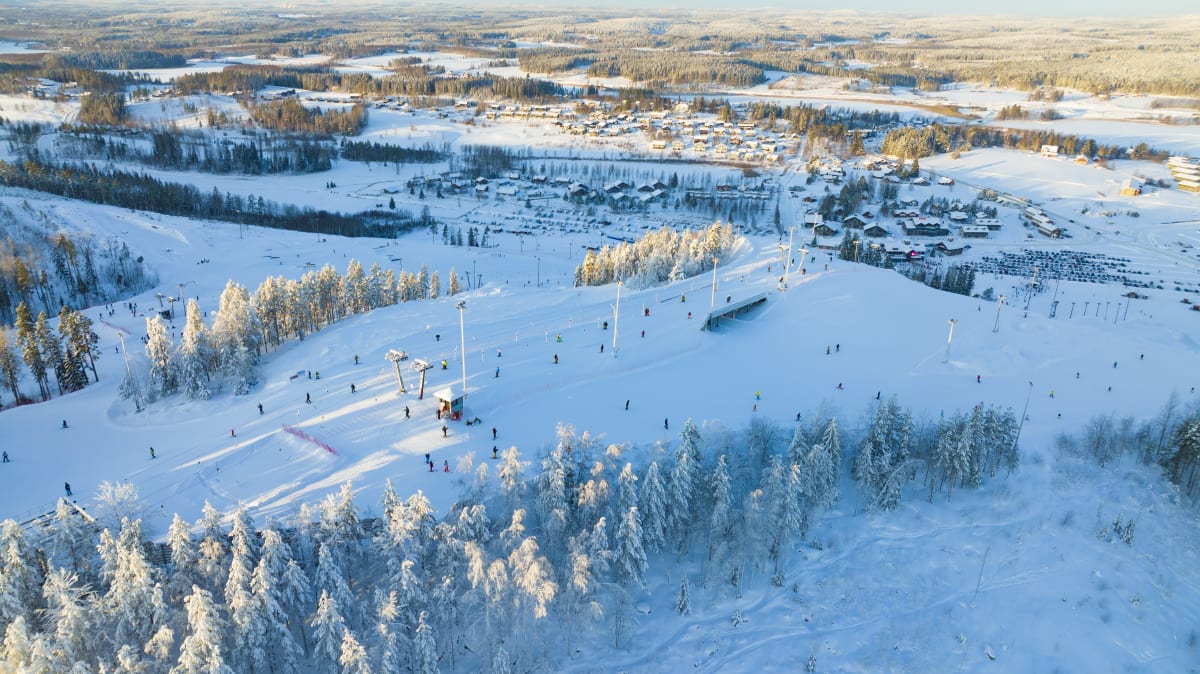 Himos in Finland: a ski resort surrounded by trees covered in snow.