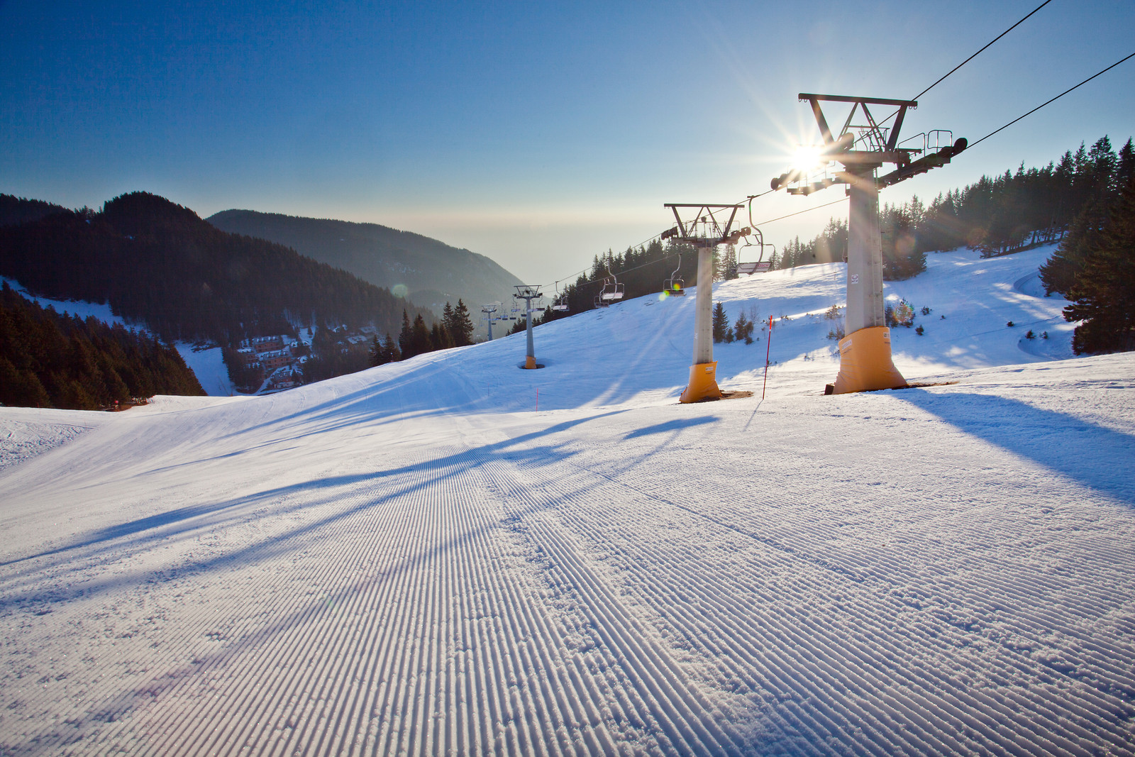 Golte in Slovenia - a person riding a ski board on a snowy slope.