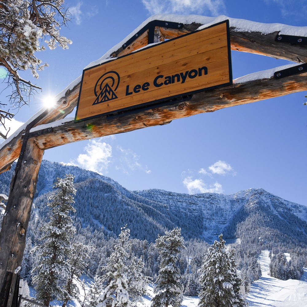 Las Vegas Ski and Snowboard Resort – Lee Canyon in USA - a wooden sign on a pole in the snow.