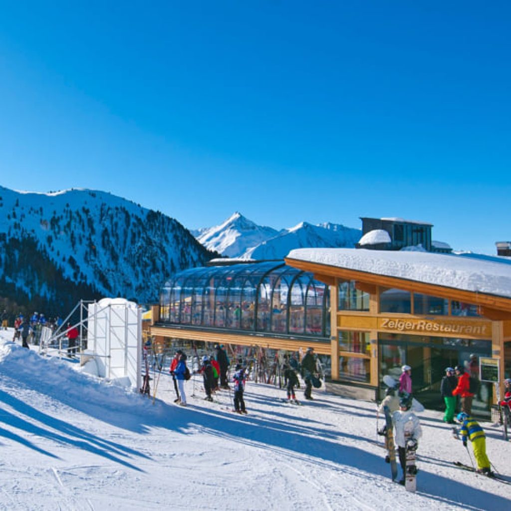 Hochzeiger – Jerzens in Austria - a group of people skiing down a snowy slope.