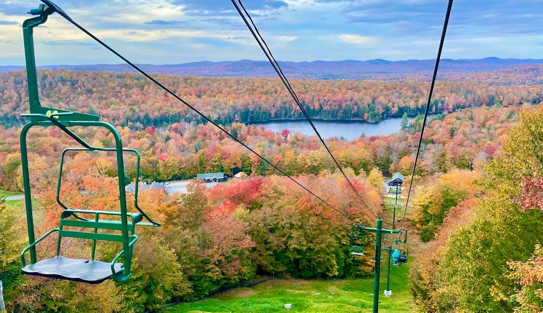 McCauley Mountain Ski Center in USA - a view from the top of a ski lift.