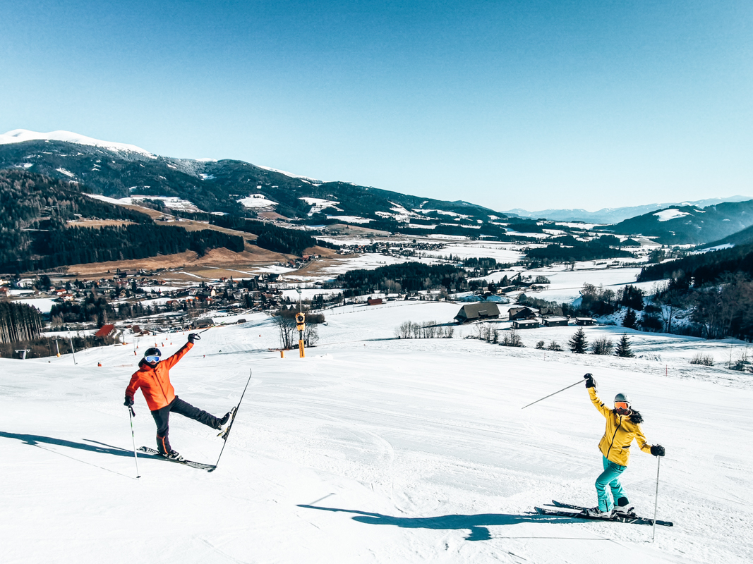 Gaaler Lifte in Austria - a group of people skiing down a snow covered hill.
