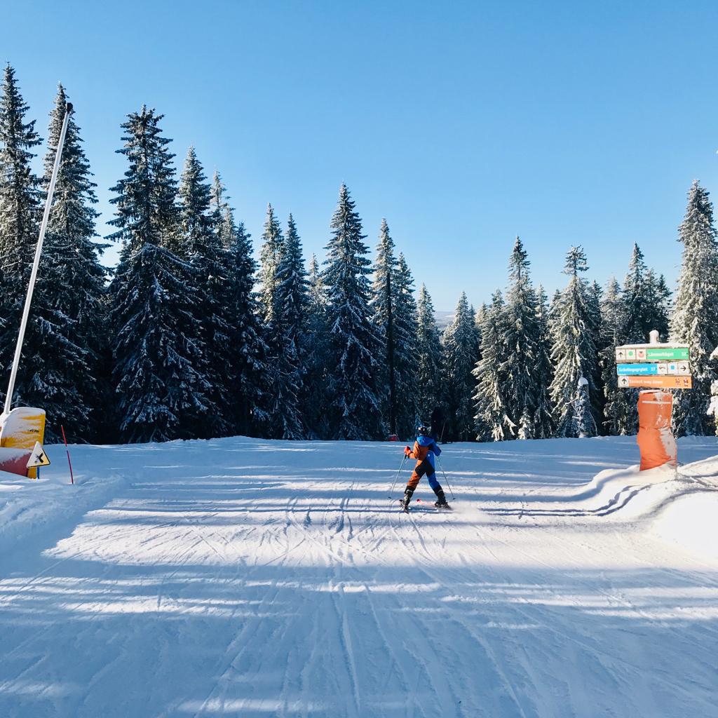 Kläppen in Sweden - a person skiing down a hill in the snow.