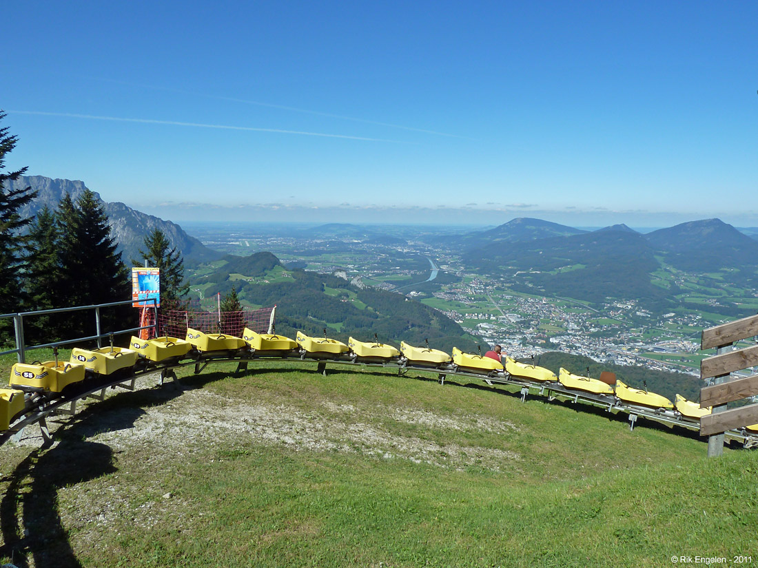 Zinkenlifte Hallein  |  Bad Dürrnberg in Austria - a bench on top of a hill with a view of a city.