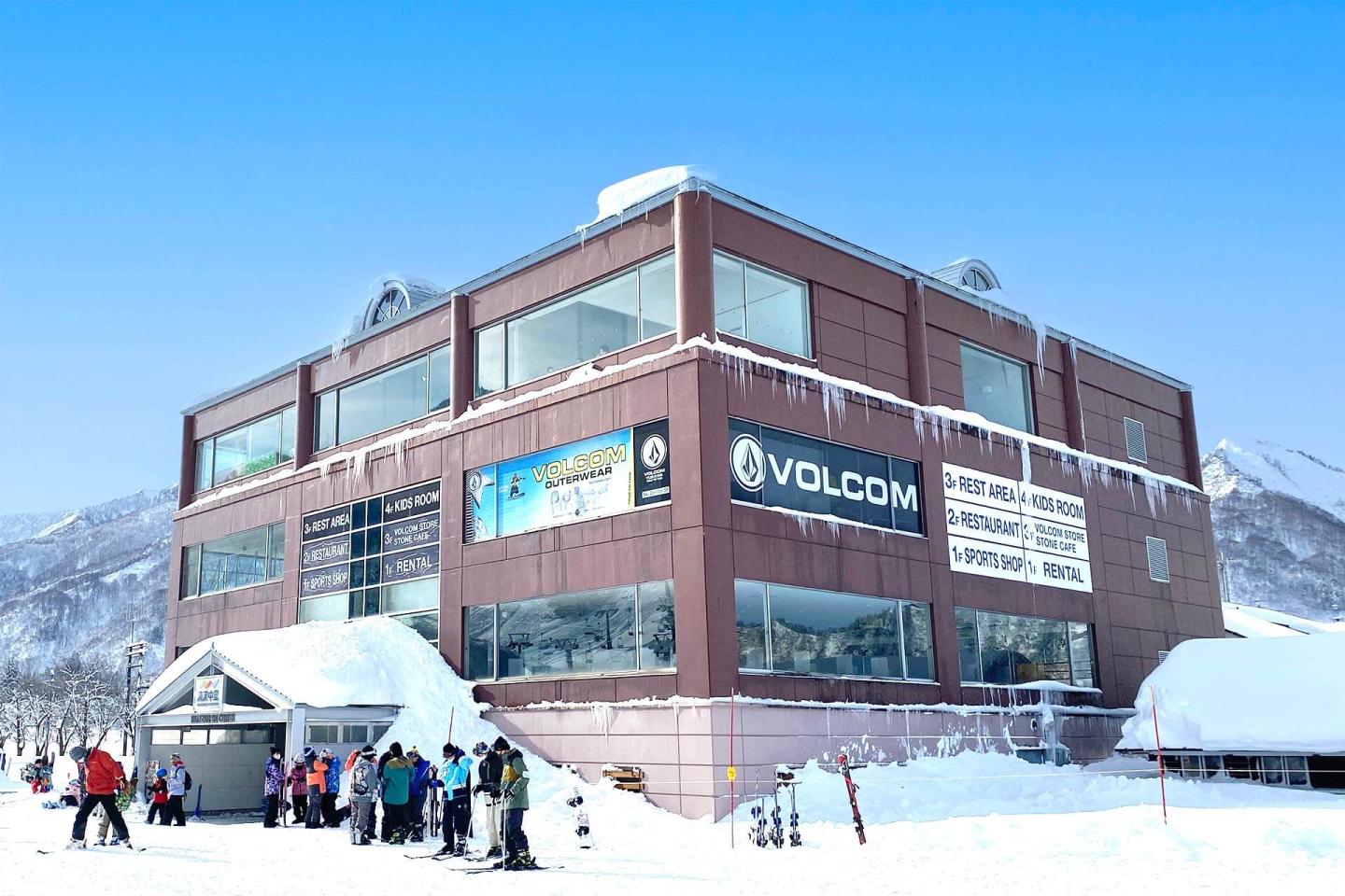 Yuzawa Nakazato in Japan: a group of people standing outside of a building.