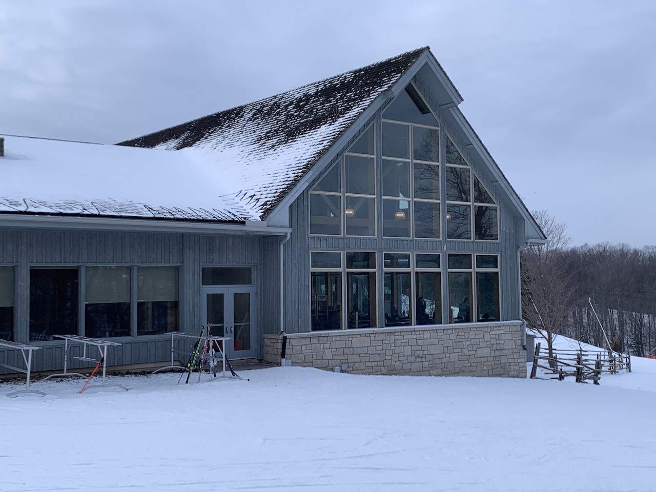 Caledon Ski Club in Canada - a house in the snow on a cloudy day.