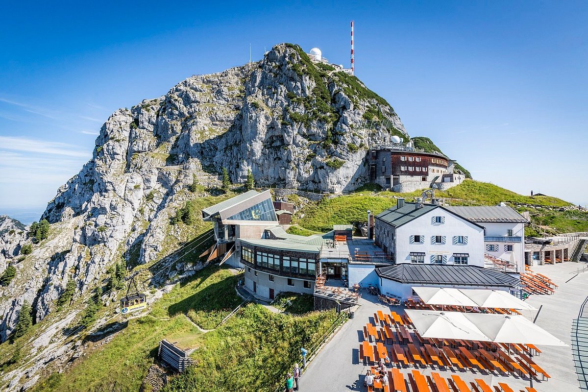Wendelstein – Brannenburg | ​Osterhofen in Germany - the view from the top of the mountain, looking down at the restaurant and restaurant.