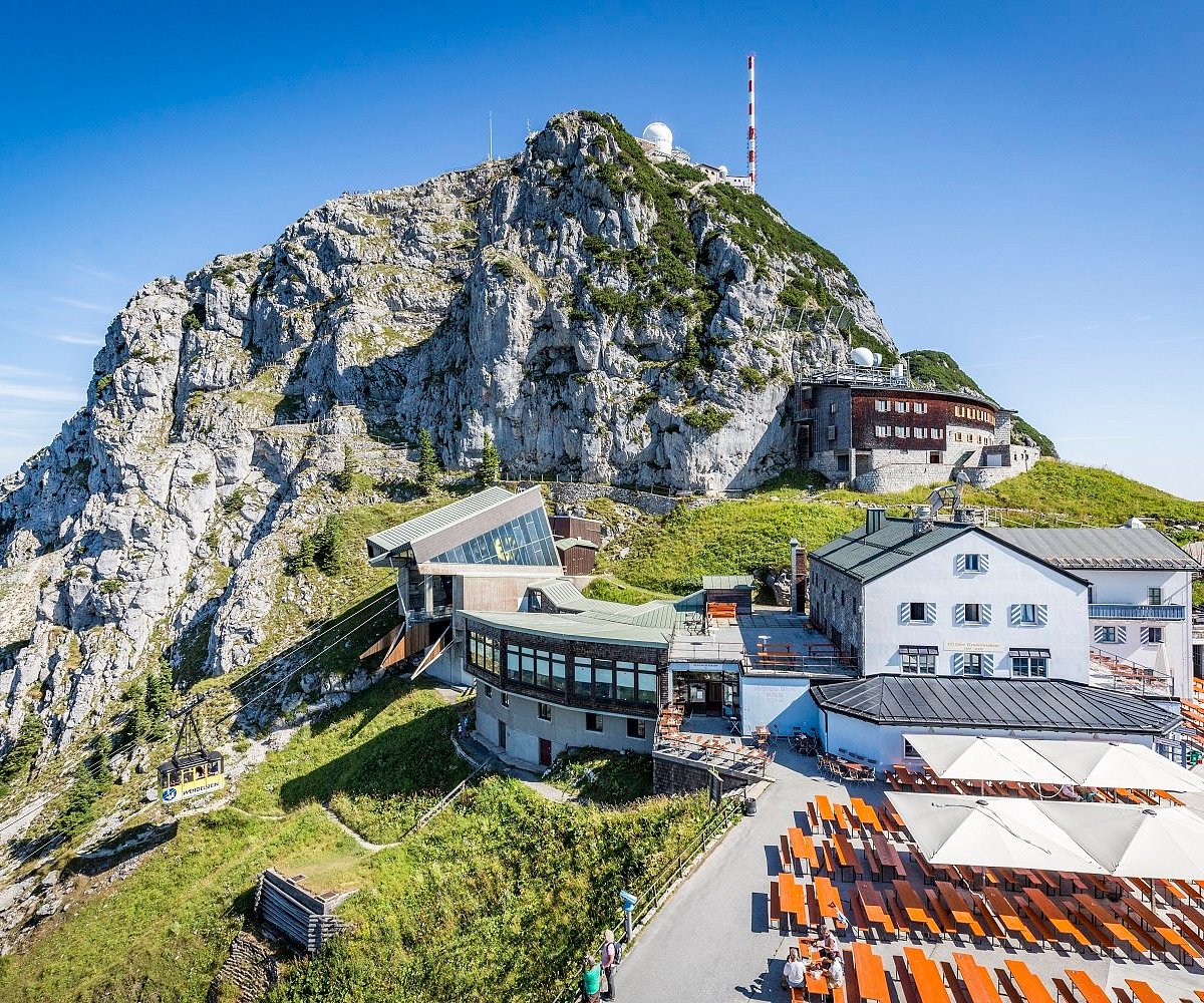 Wendelstein – Brannenburg | Osterhofen in Germany - the view from the top of the mountain, looking down on the town and the lighthouse.