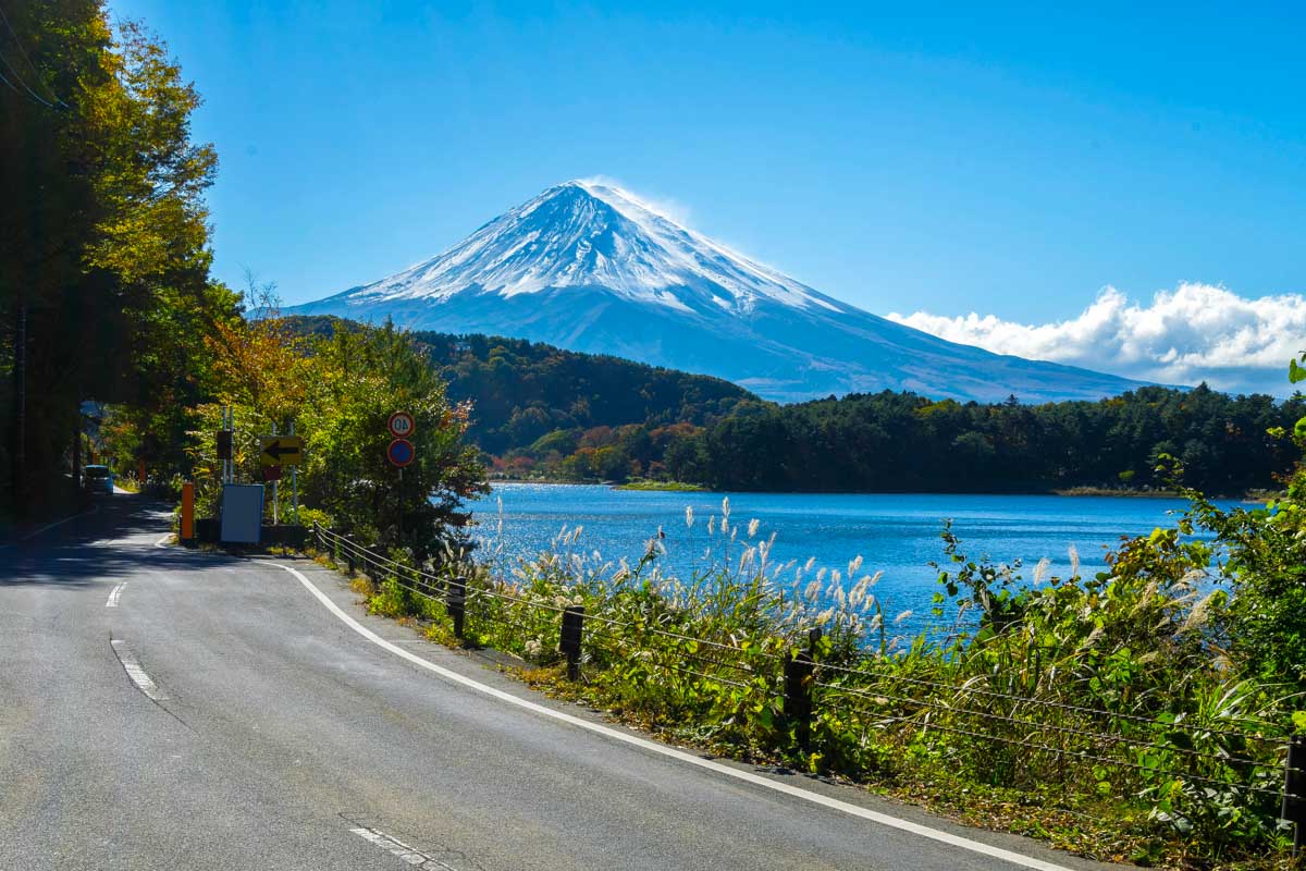 The Cupid of Romance in Japan - a road with a mountain in the background.