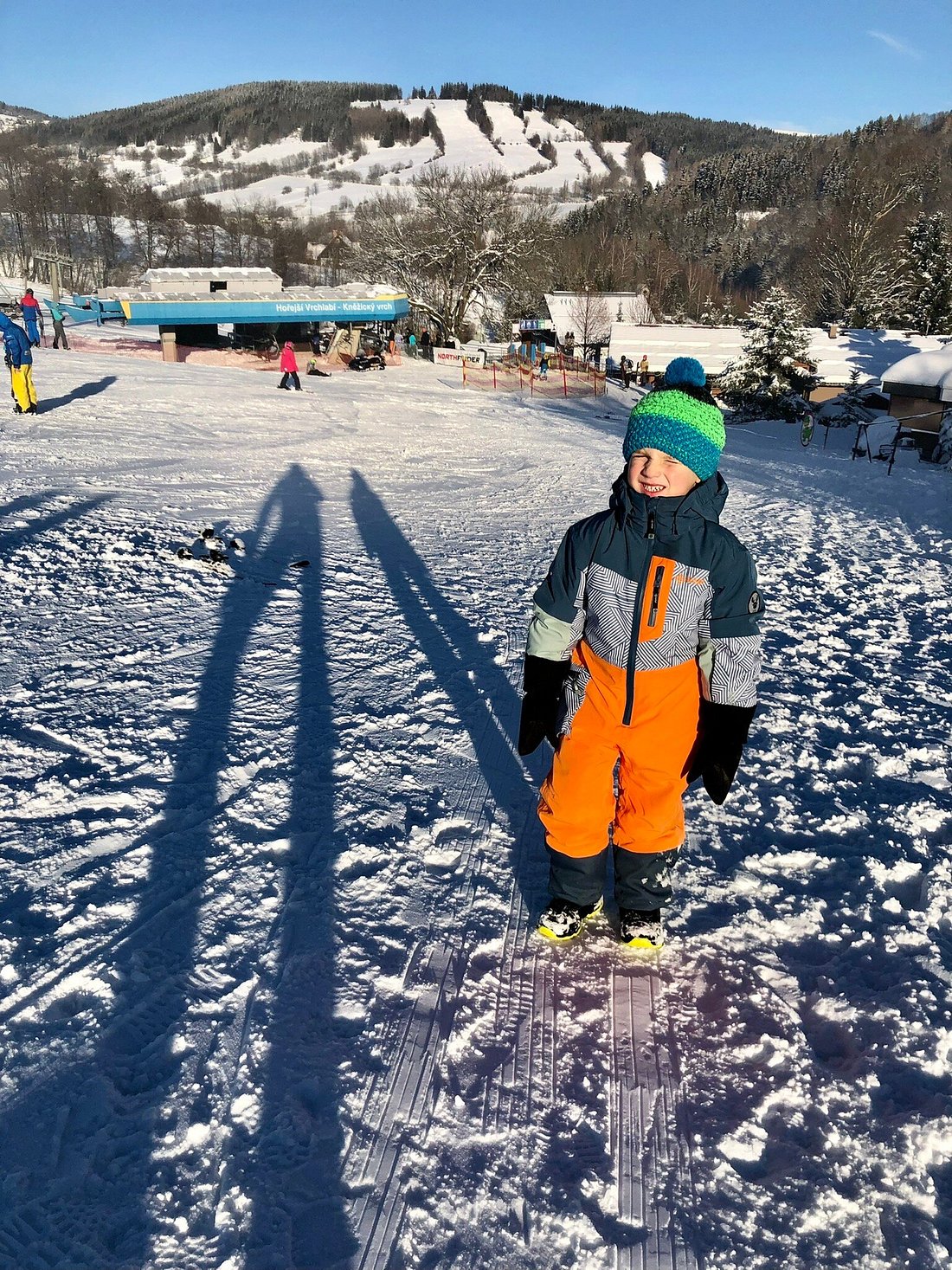 Vrchlabí – Kněžický vrch in Czech Republic - a person on a snowboard in the snow.