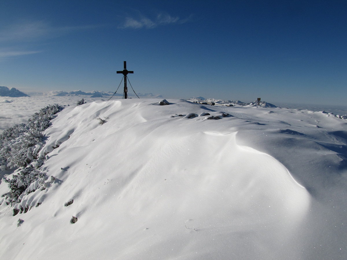 A chalet nestled against the snowy slopes of Unterberg mountain in Wiener Alpen, Thal, Lower Austria, highlighting a serene winter scenery.
