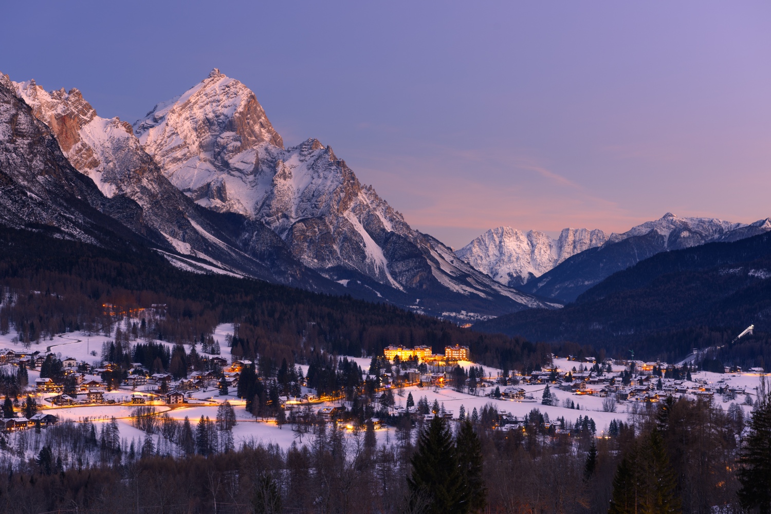 Cortina d'Ampezzo in Italy - the mountains are covered in snow.