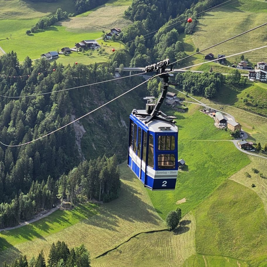 Seilbahnen Sonntag in Austria - a cable car in the middle of a mountain.