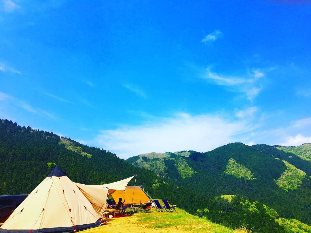 Wakasugi Kogen Oya in Japan - a tent on the side of a mountain.