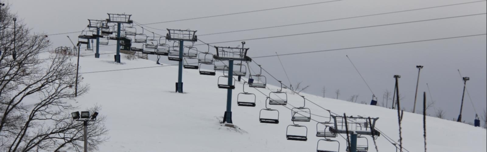 Boler Mountain in Canada - a ski lift going up a snowy mountain.