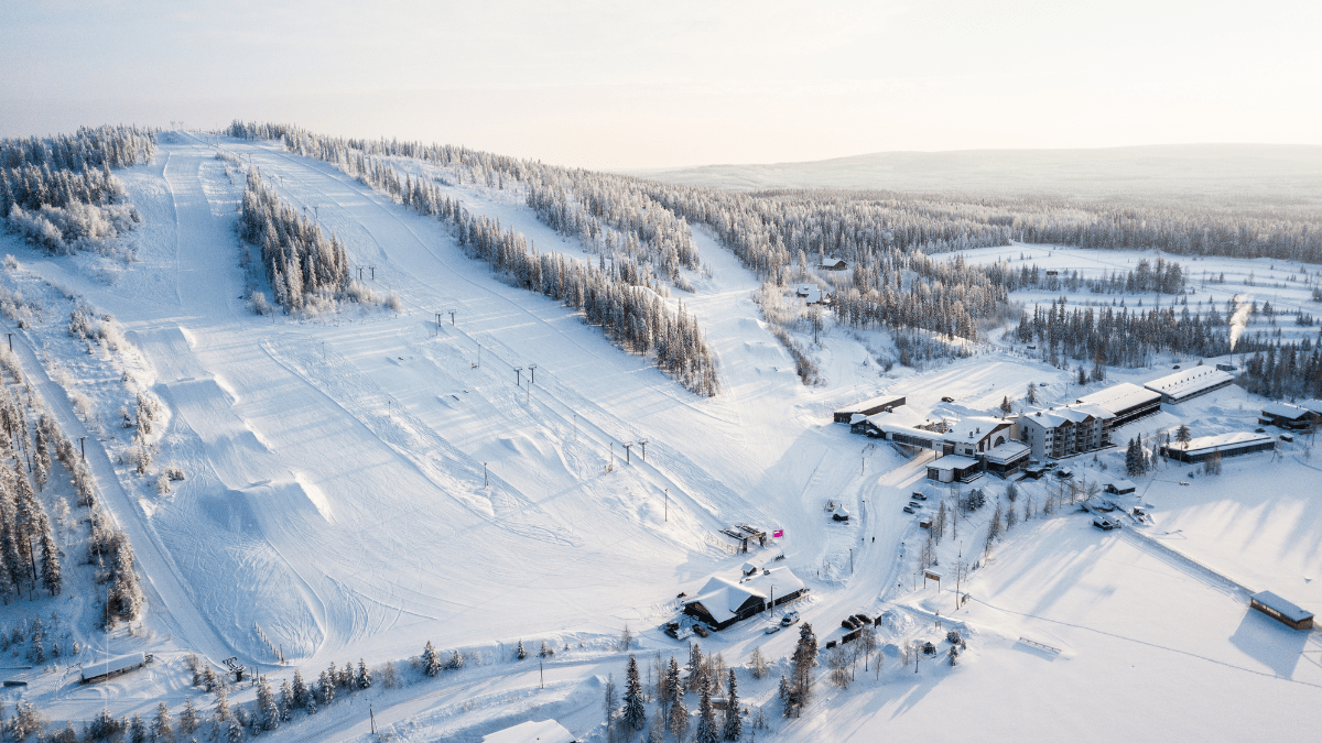Ukkohalla in Finland: an aerial view of a ski resort surrounded by trees.