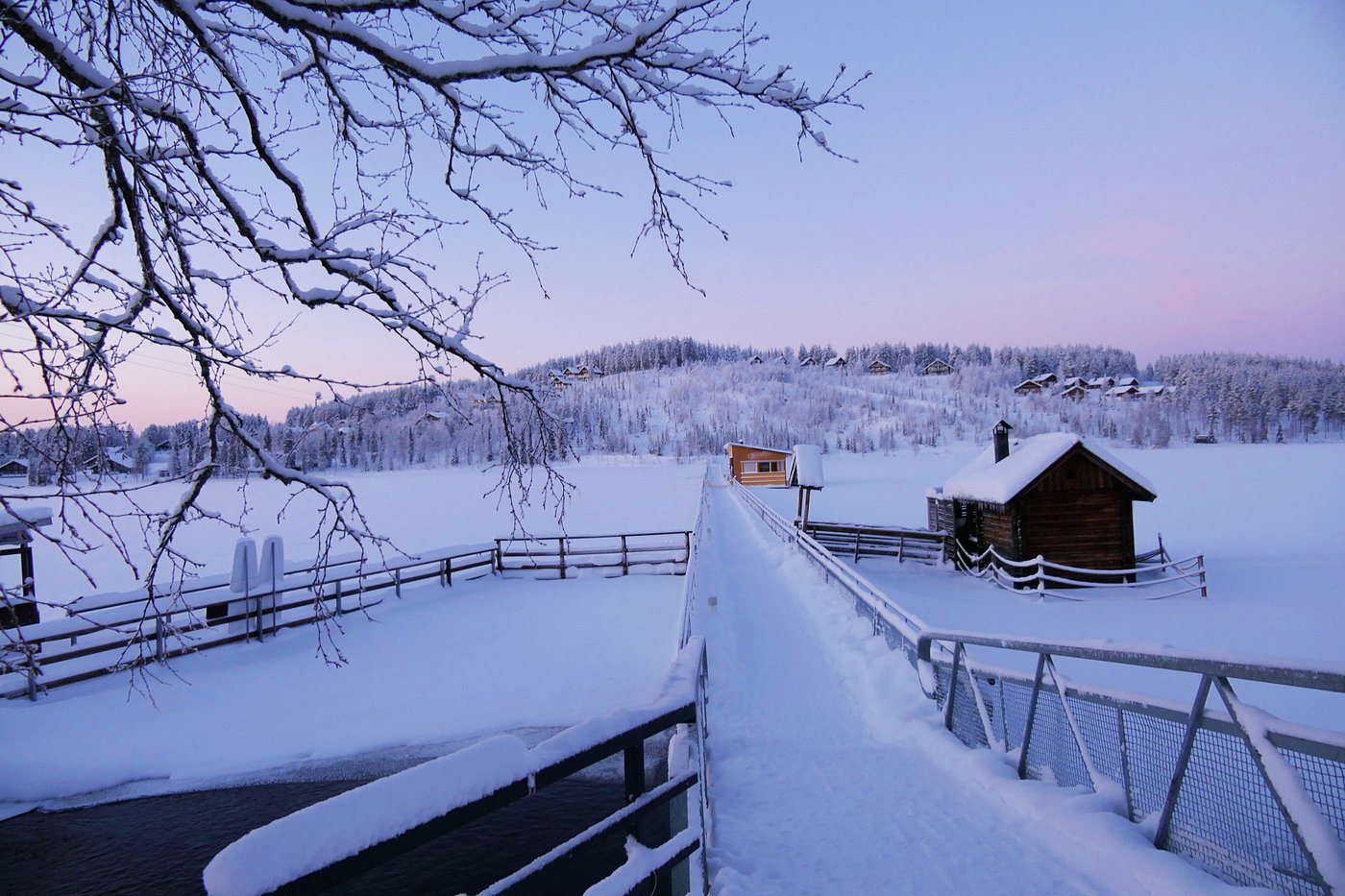 A captivating winter scene in Ukkohalla, Kainuu, East Finland featuring a pristine ski resort amidst the breathtaking winter scenery, representing a vibrant winter sports scene.