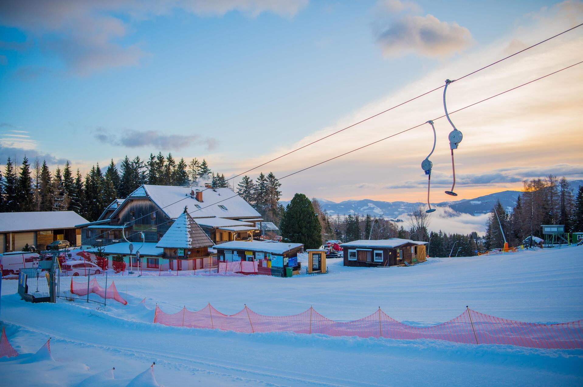 Rieseralm in Austria: a ski resort with a ski lift in the background.