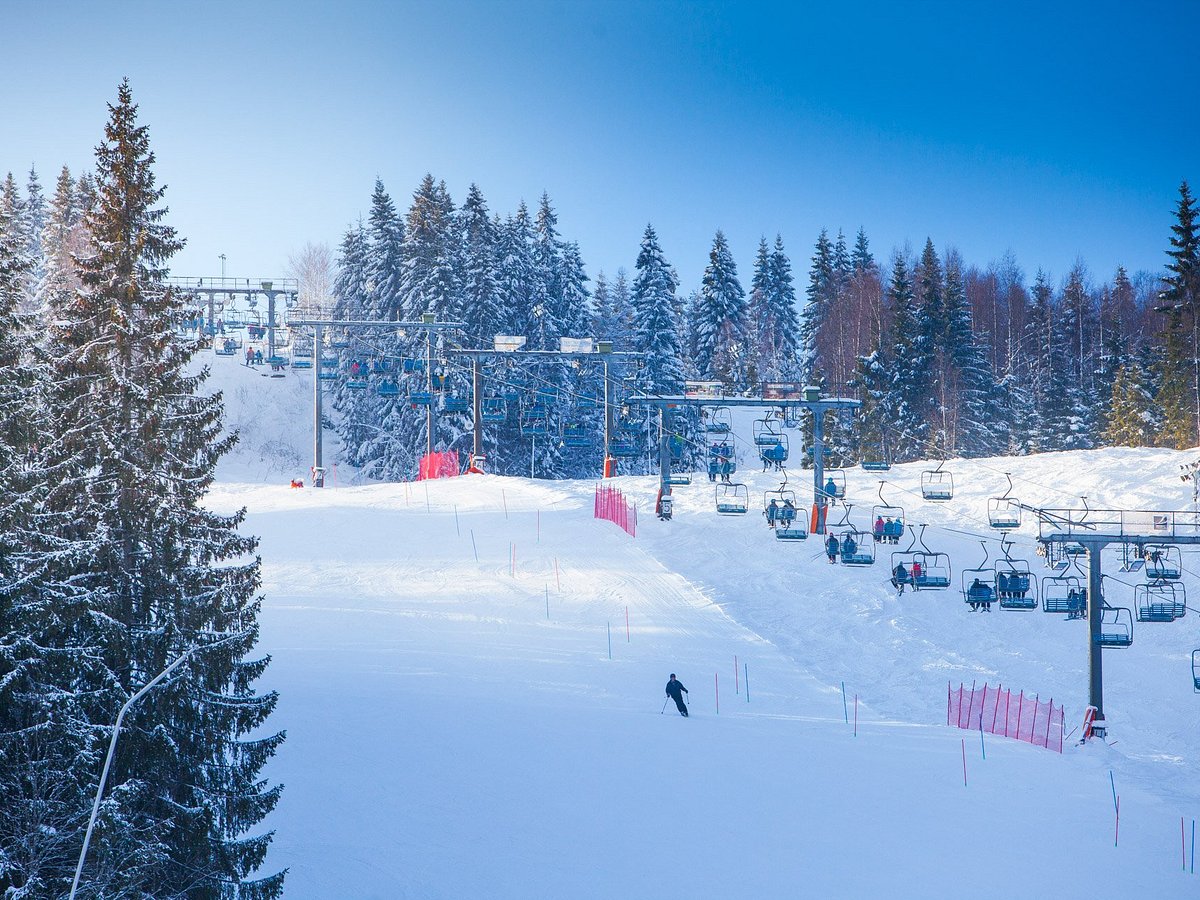 Sunne in Sweden - a snow covered ski slope with trees in the background.