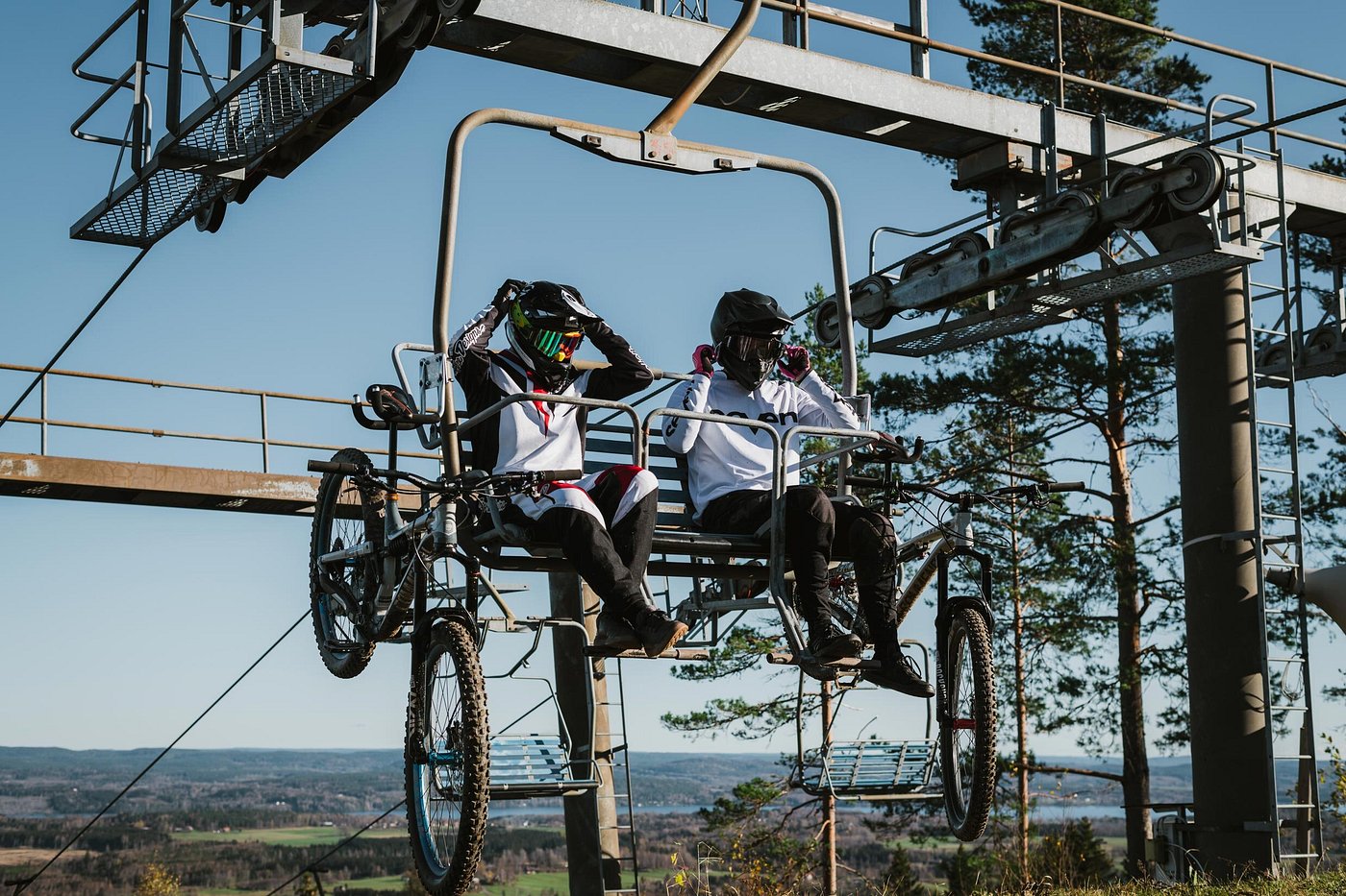 A picturesque snapshot of Sunne in Rottneros Central Sweden featuring a ski lift a mountain bike set against a captivating winter sports scene at a ski resort.