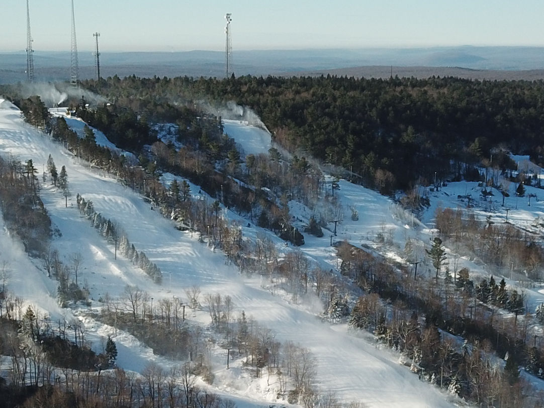 Big Boulder in USA - a ski slope covered in snow with trees in the background.