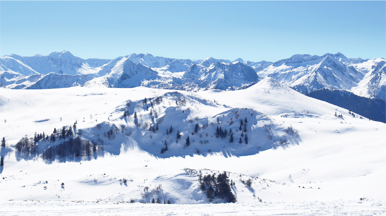 View of Camurac ski resort in Occitanie, France showcasing snow-covered slopes, a cozy challet, and a striking winter scenery, creating a perfect winter sports ambiance.