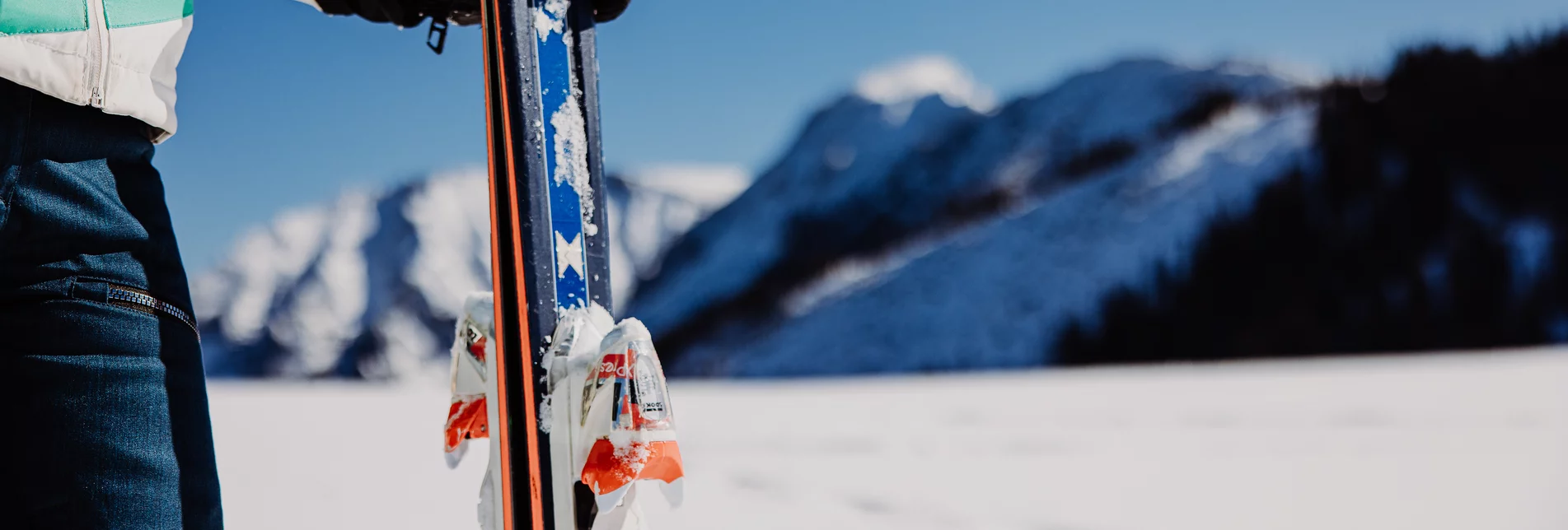 Niederalpl in Austria - a person holding skis in the snow.