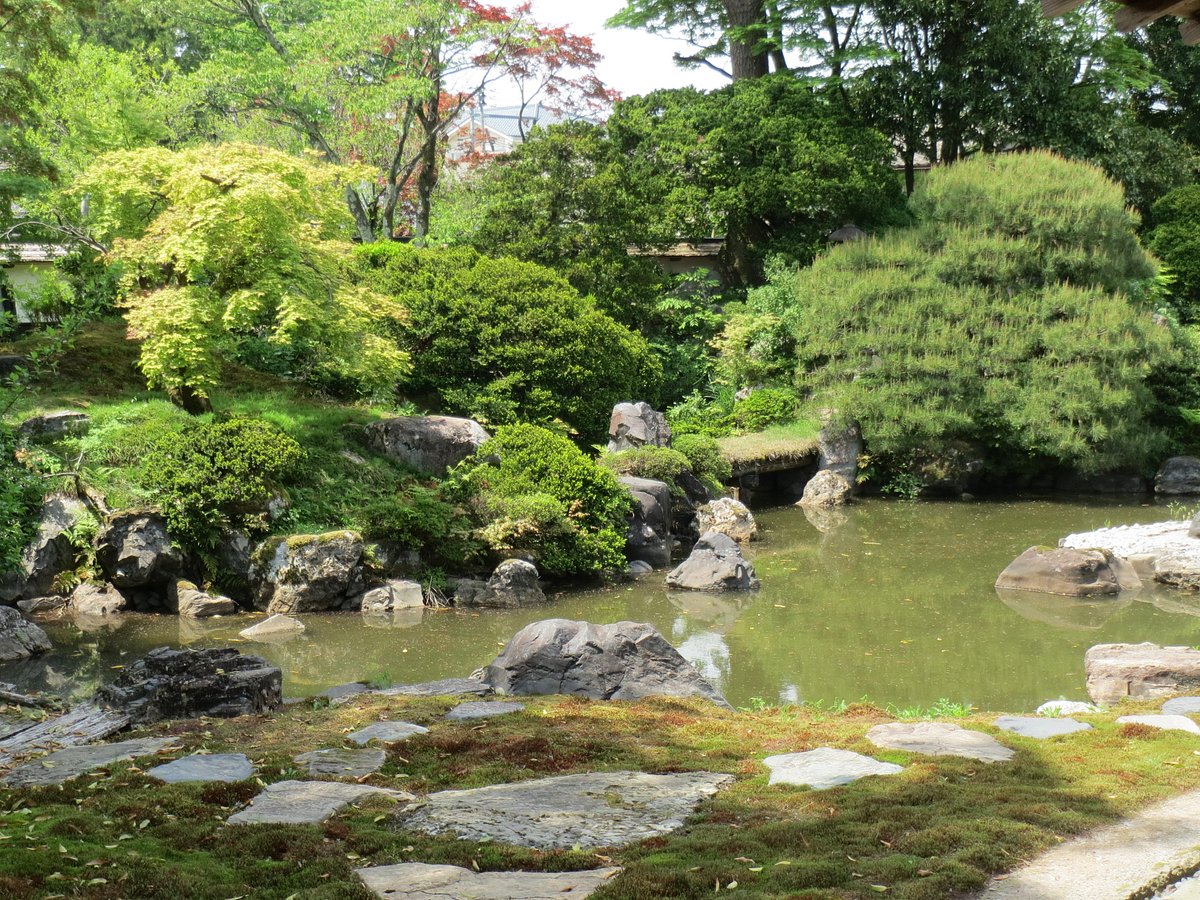 Wakabuna Kogen in Japan - a small pond in the middle of a garden.