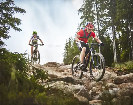A mountain biker enjoying a ride in the stunning scenery of Isaberg Mountain Resort, Hestra, South Sweden.