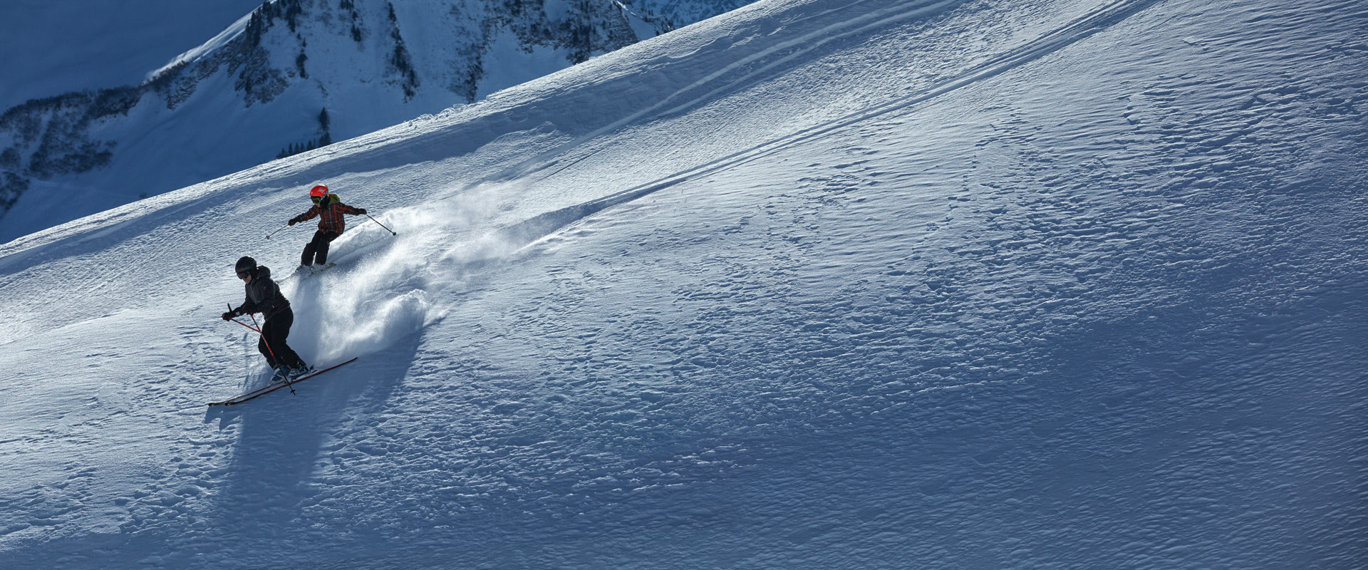 Hochhäderich – Hittisau in Austria - a person riding a snowboard down a snowy slope.