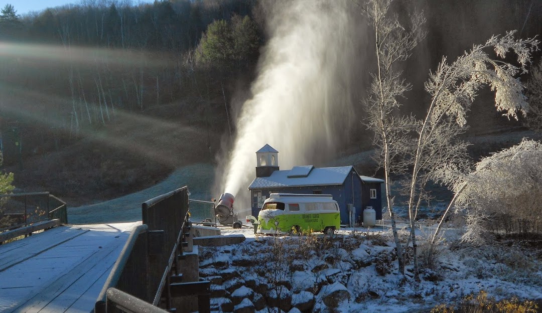 Winter sports enthusiasts enjoying the day at Granite Gorge Mountain Park an idyllic ski resort in Roxbury New Hampshire surrounded by stunning winter scenery.