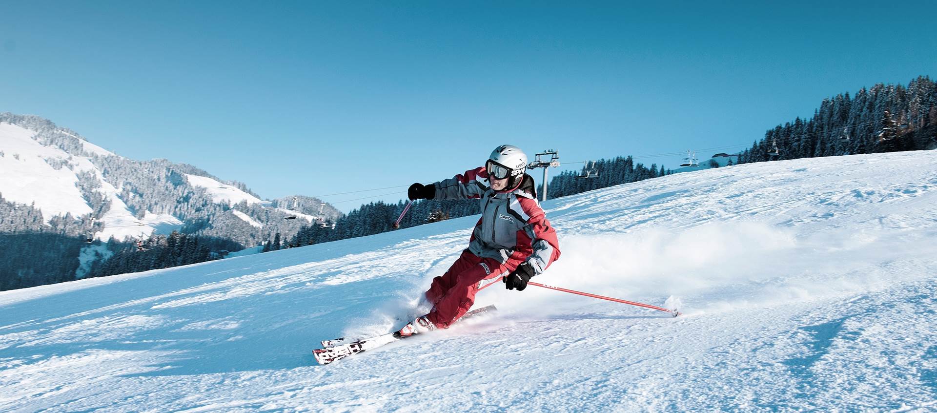 Schneeberglifte – Mitterland in Austria - a person skiing down a snowy slope.