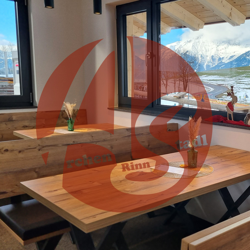 Archenstadel – Rinn in Austria - a restaurant with a view of a mountain range.