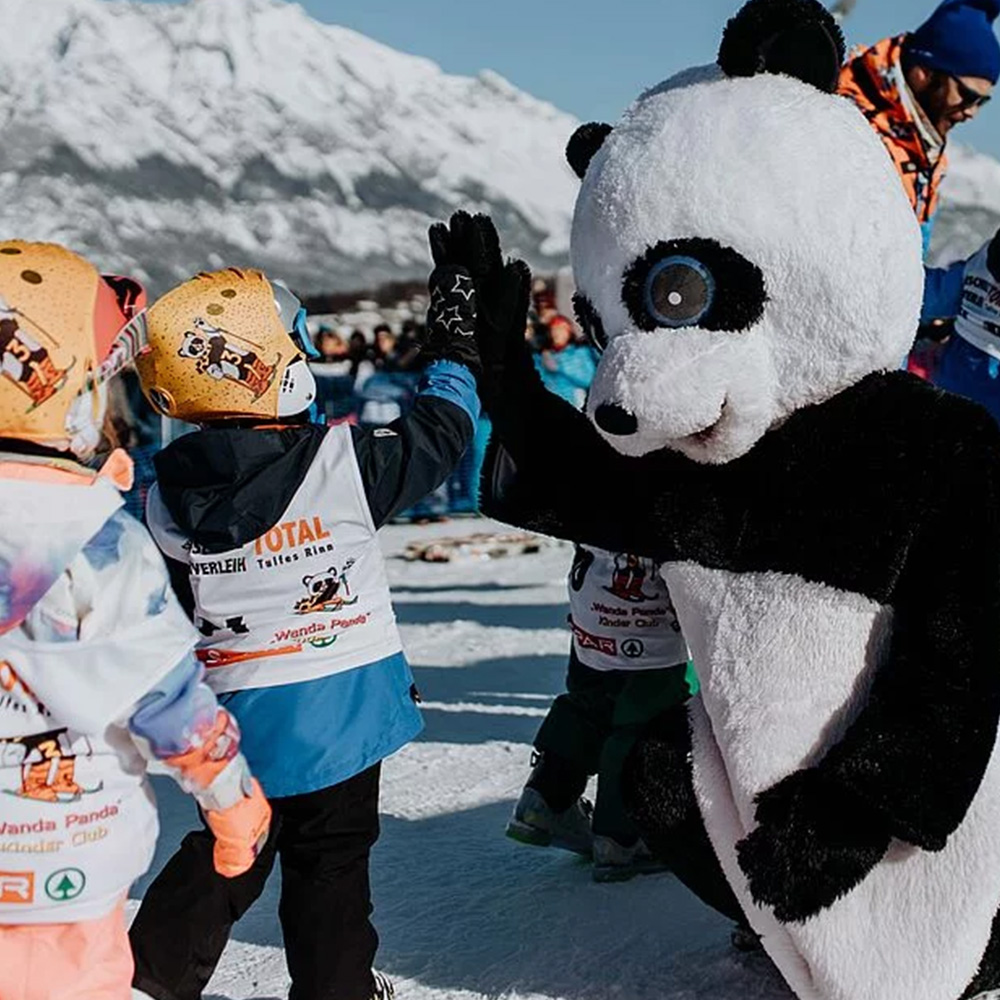 Archenstadel – Rinn in Austria - a group of children standing next to a giant panda.