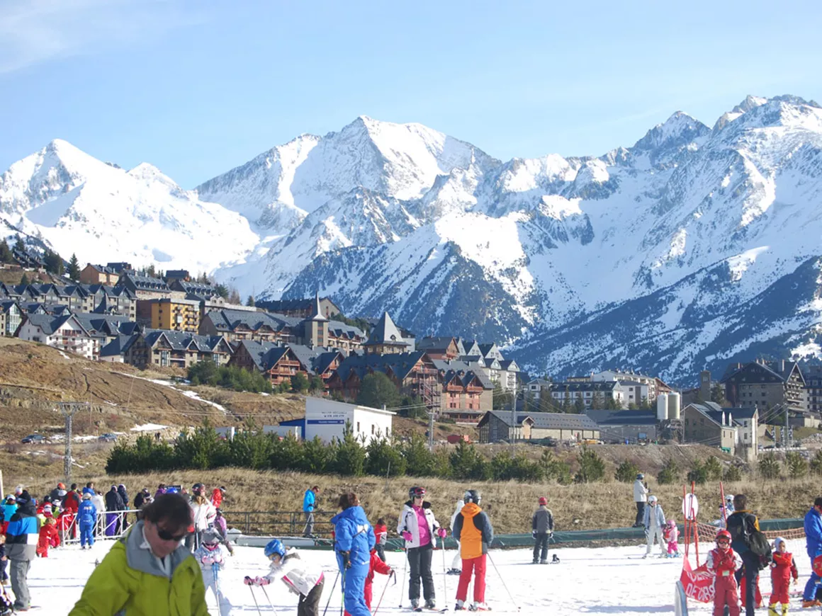 Formigal in Spain - a group of people skiing in the snow.