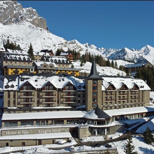 Formigal in Spain: the hotel is surrounded by snow covered mountains.