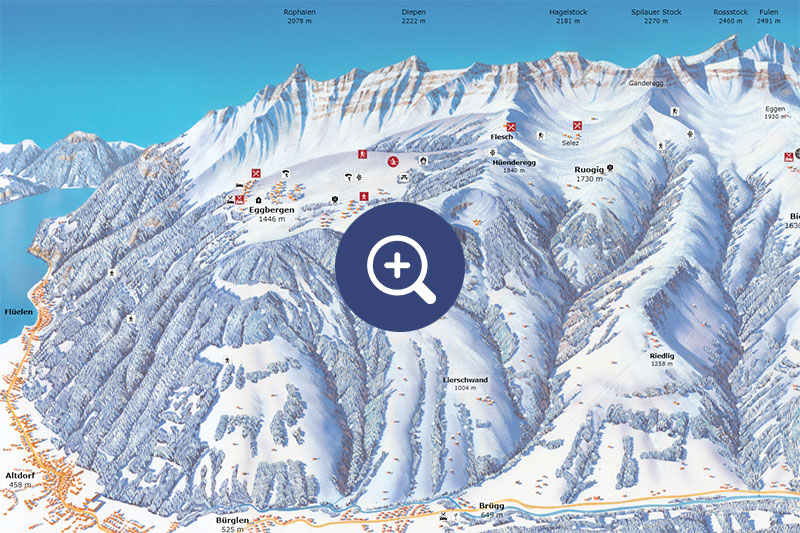 View of Eggberge ski resort in Central Switzerland featuring surrounding chalets and a ski lift. The winter sports scene depicts a tranquil snowy landscape.