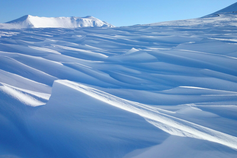 Asahidake in Japan - a snow covered mountain.