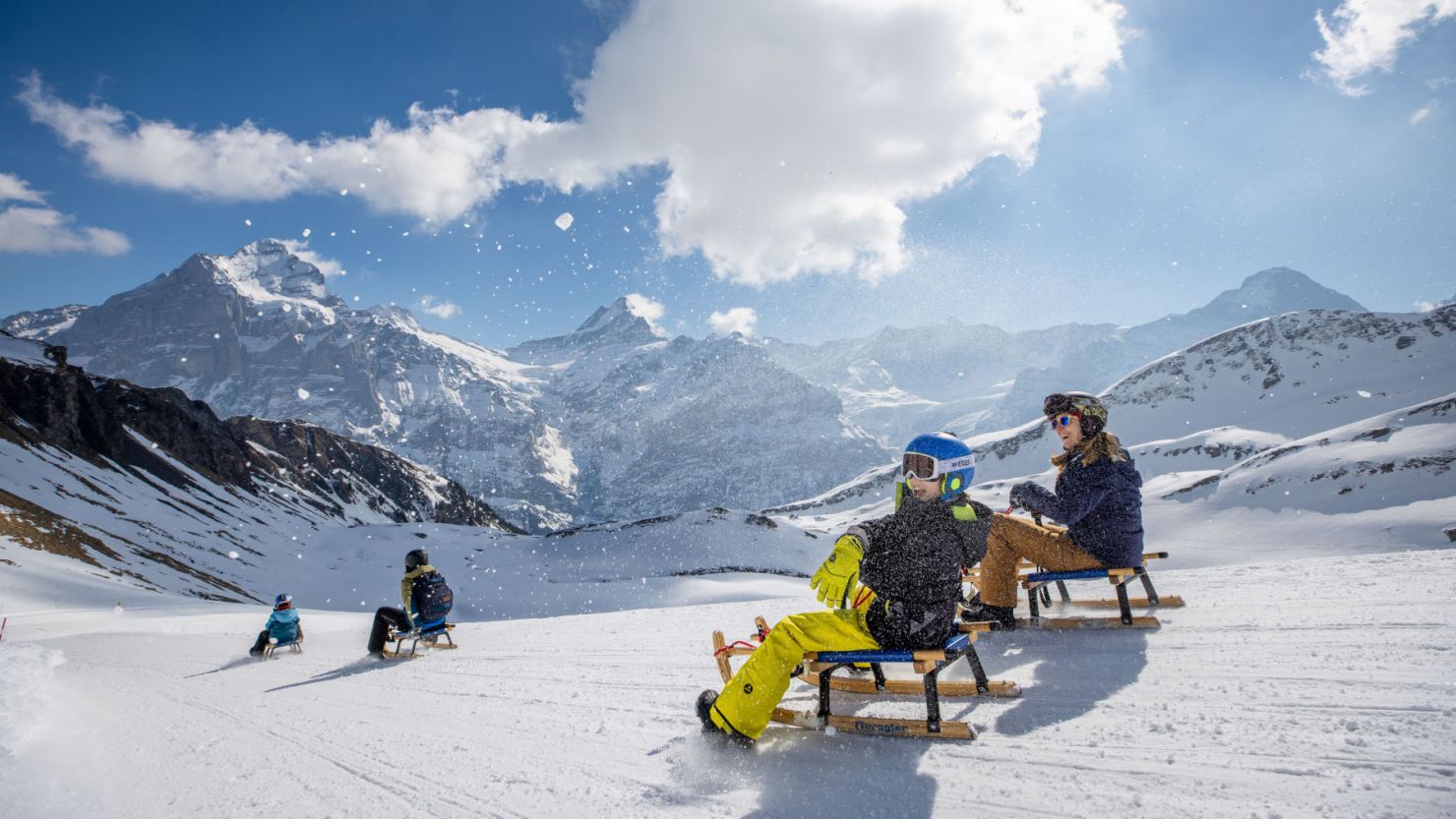 Fideriser Heuberge in Switzerland - a group of people on a snowy mountain.
