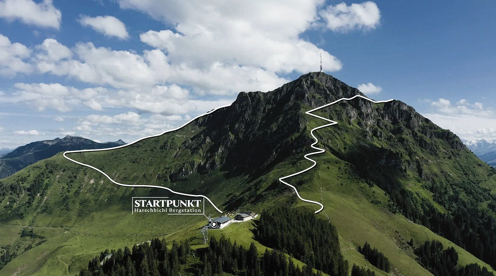 St Johann in Tirol | ​Oberndorf – Harschbichl in Austria - a mountain with a road going through it.