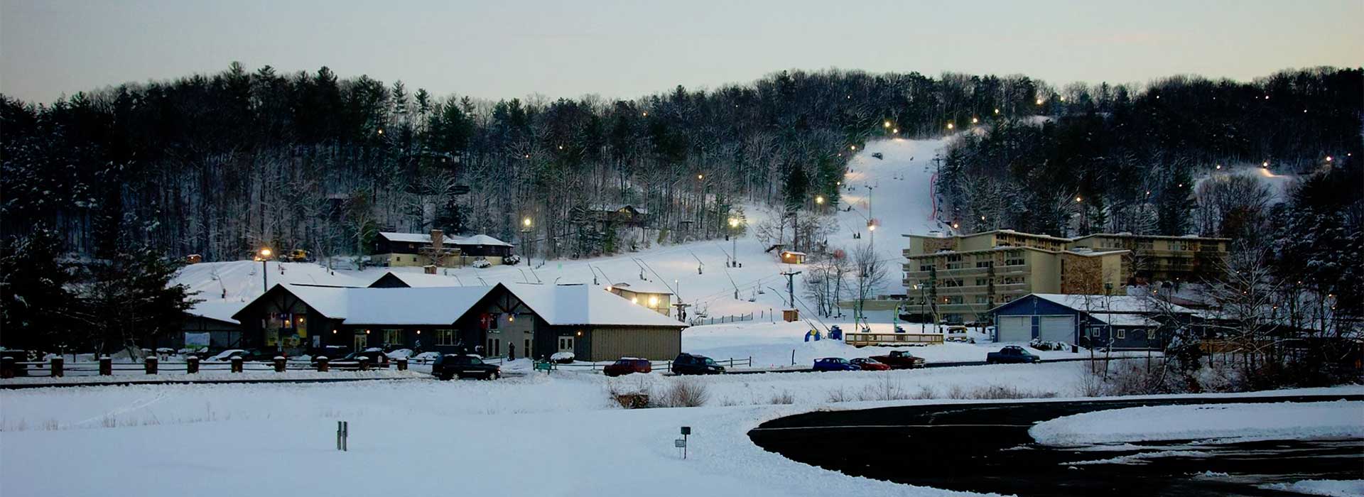 Bryce Resort in USA: a ski resort in the winter with snow on it.