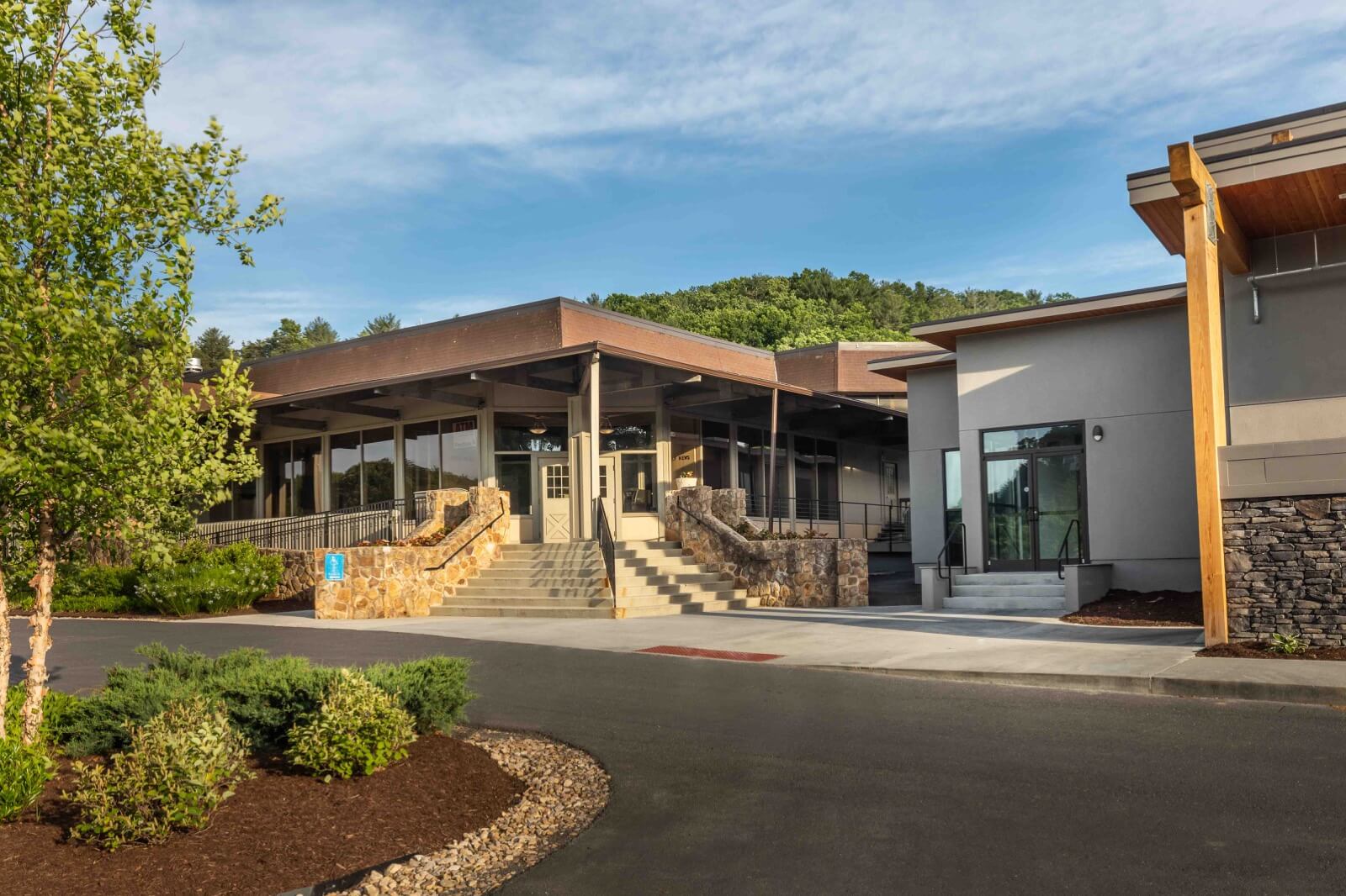 Bryce Resort in USA: the front entrance of a building with a stone walkway leading up to it.